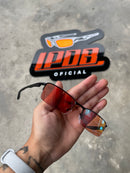 Óculos de Sol Lupa do Vilão Preto Lente Clear Ruby